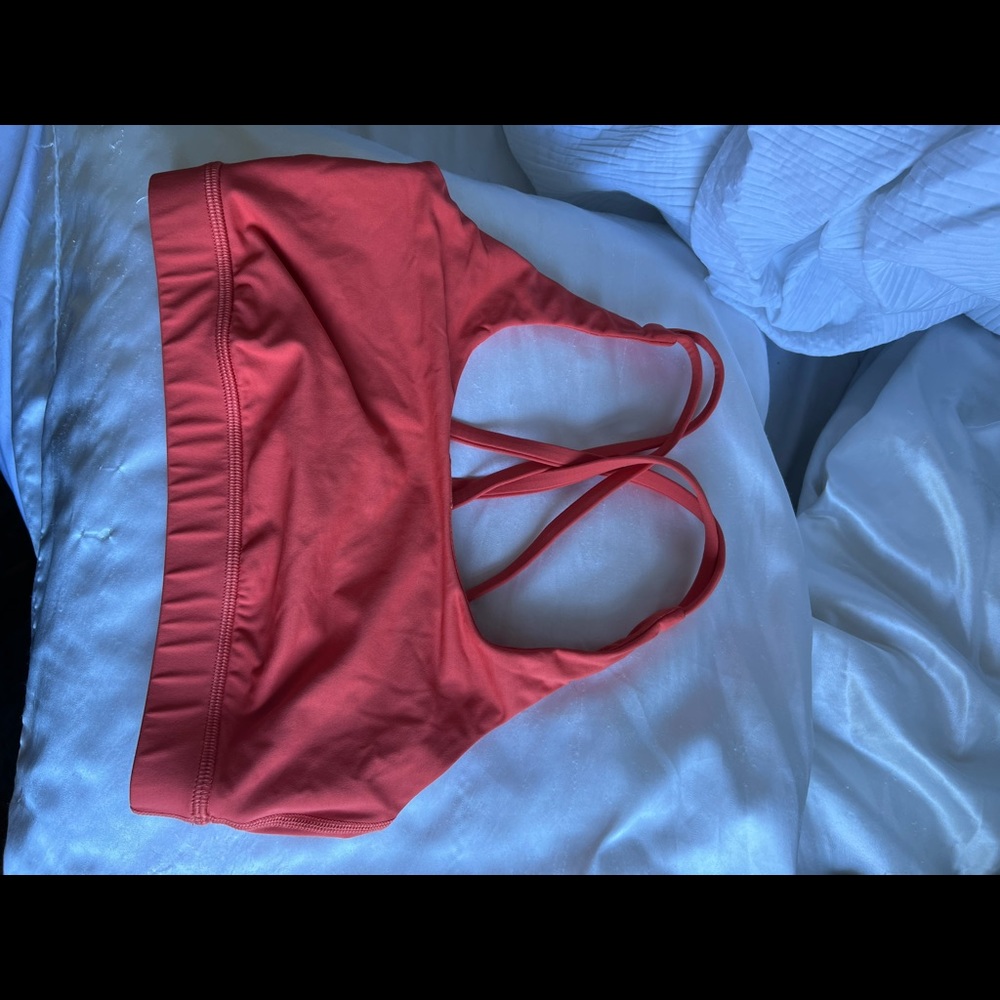 Orange Lulu Lemon sports bra